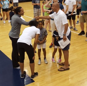 Stevie Mussie shakes hands with James Franklin