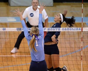 Junior Nicole Lott rises for one of her 17 kills Friday against North Carolina